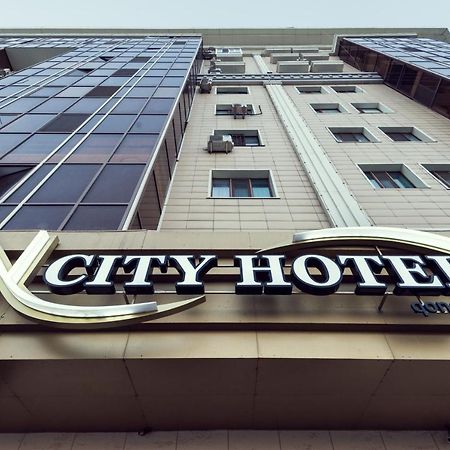 Ncityhotel Astana Bagian luar foto