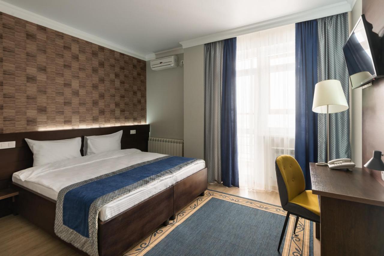 Ncityhotel Astana Bagian luar foto