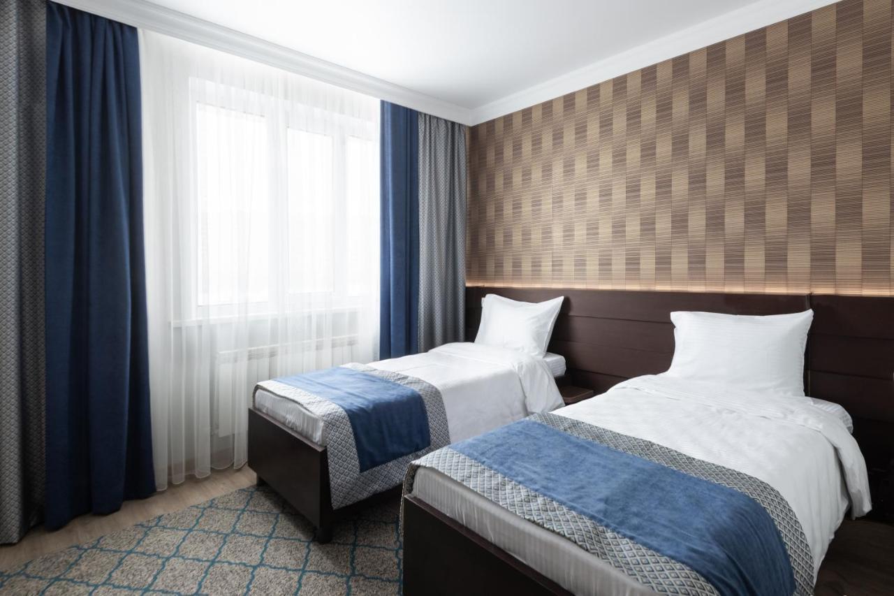 Ncityhotel Astana Bagian luar foto