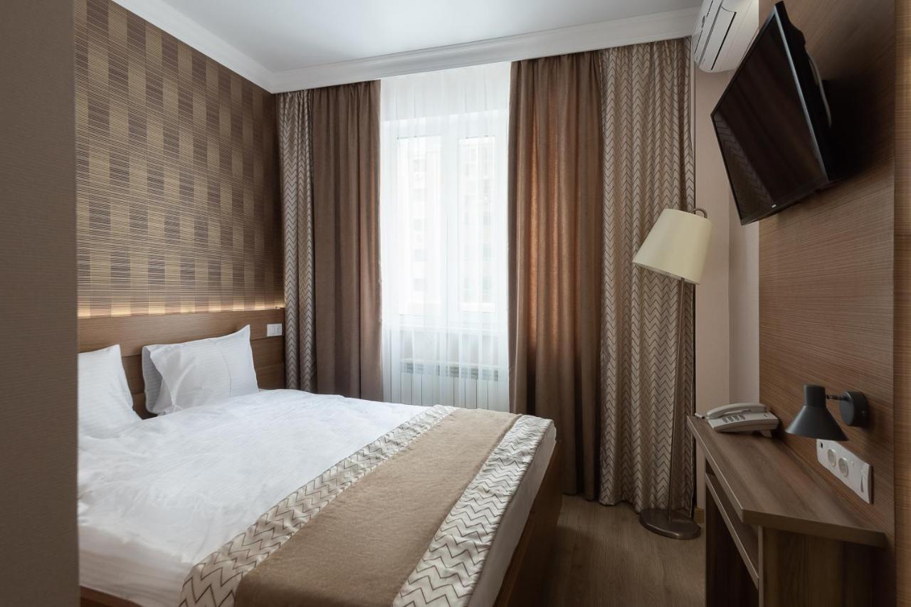 Ncityhotel Astana Bagian luar foto