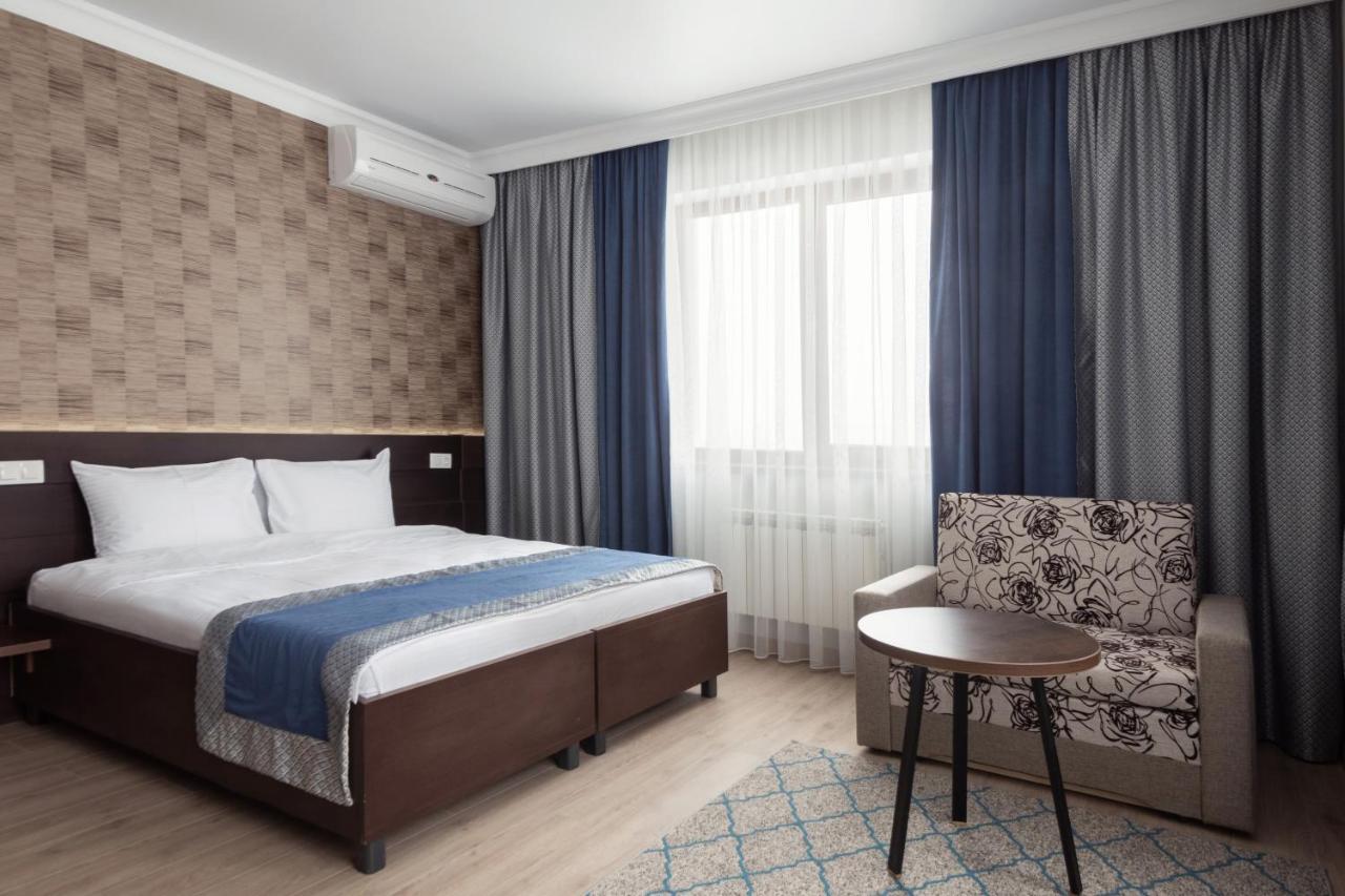 Ncityhotel Astana Bagian luar foto